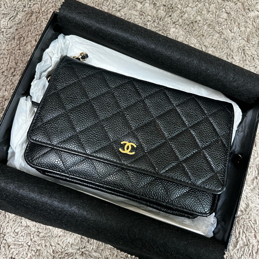 CHANEL Black Crossbody Bag with Iconic Quilted Design
